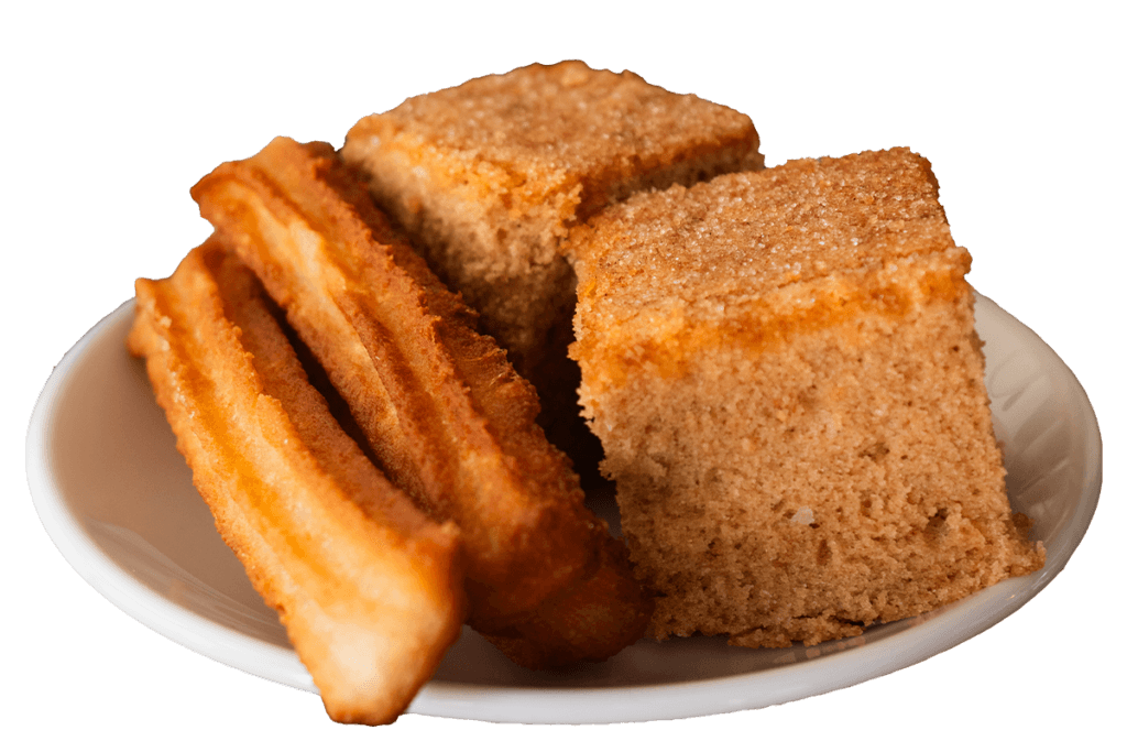 Churros y bizcochos de cortesía que acompañan al caféen cafetería revitalizada por clv